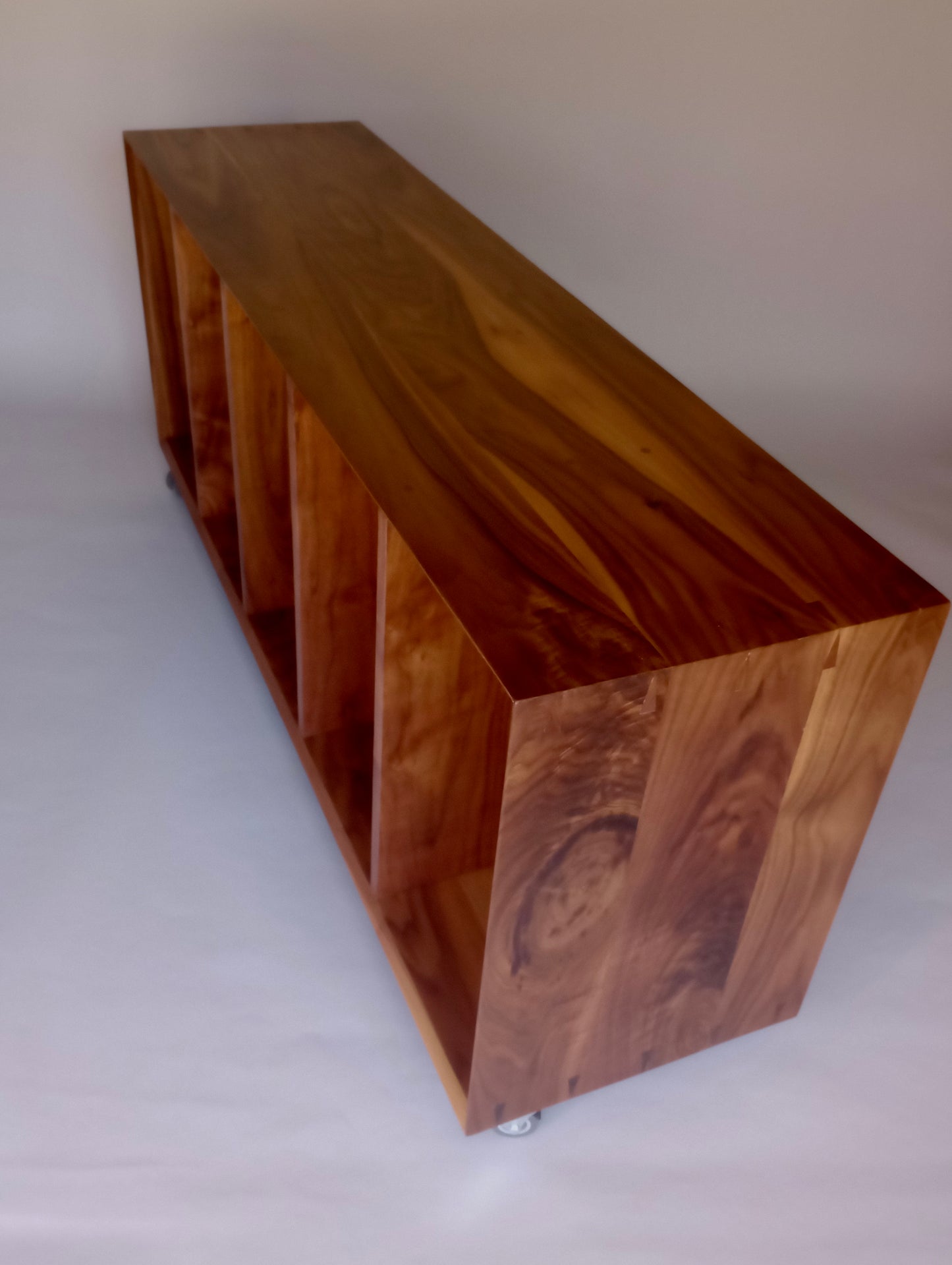 Walnut basket storage console on wheels