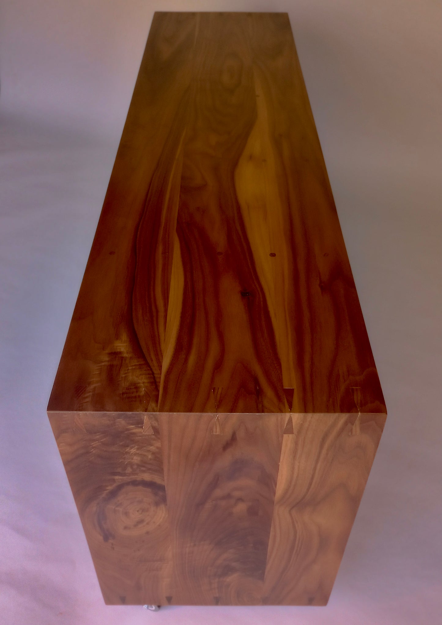 Walnut basket storage console on wheels