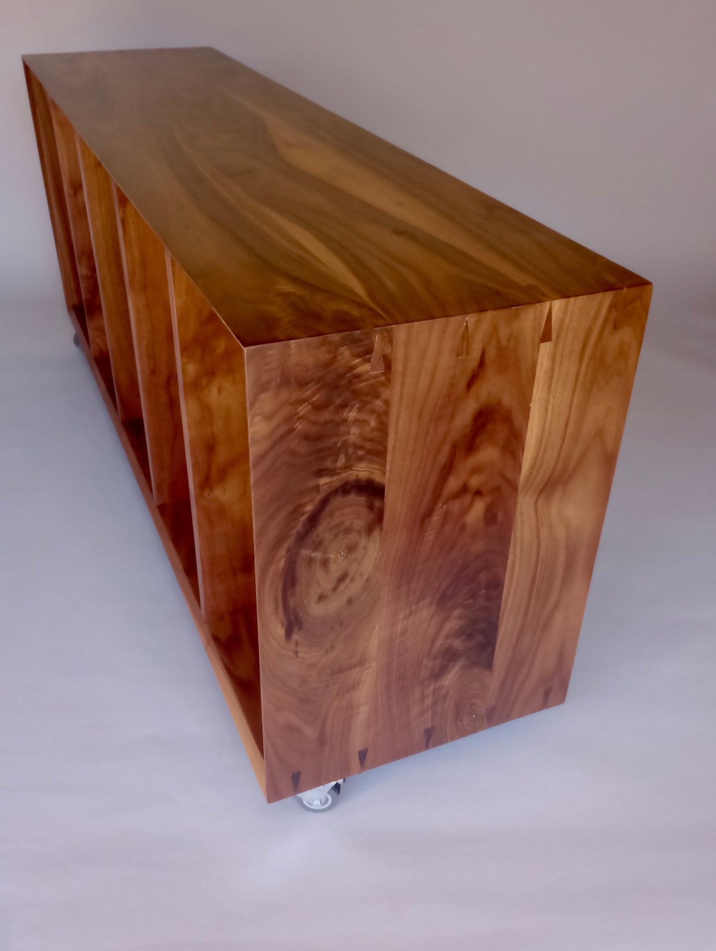 Walnut basket storage console on wheels