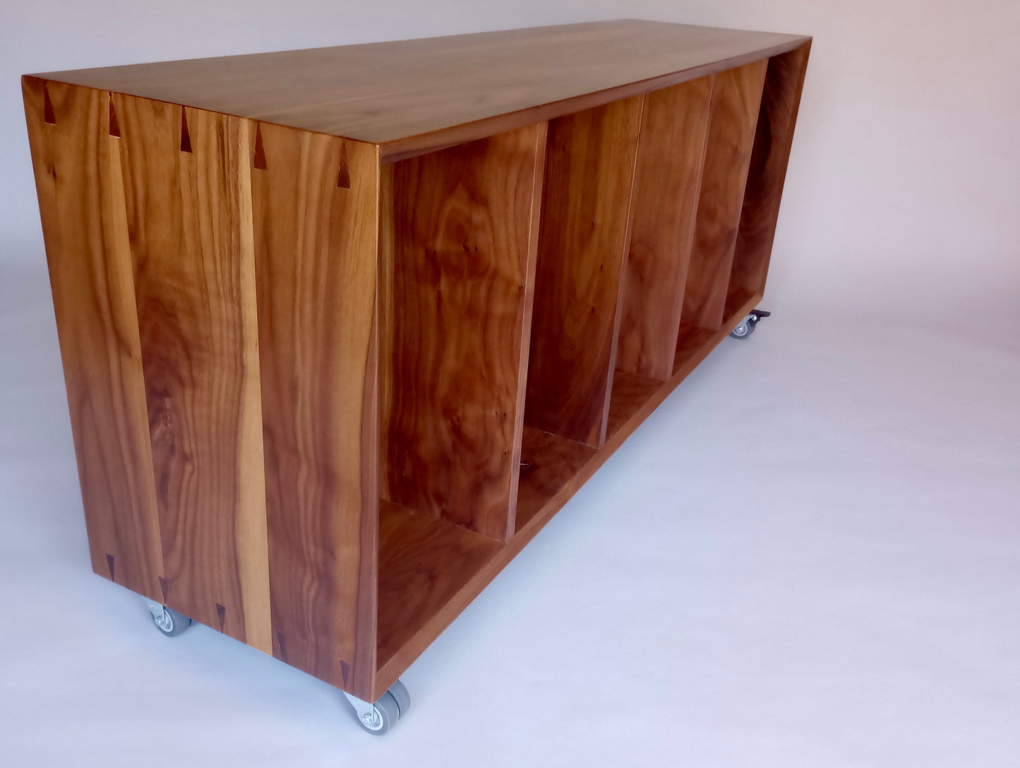 Walnut basket storage console on wheels